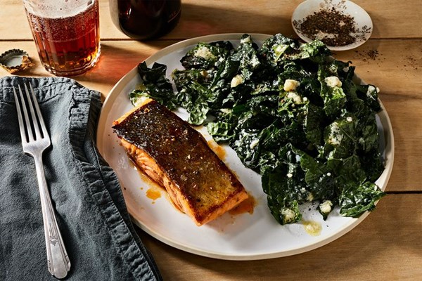 Buffalo-glazed salmon with blue cheese kale salad