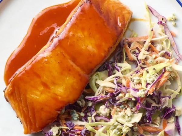 Buffalo glazed salmon with creamy blue cheese slaw