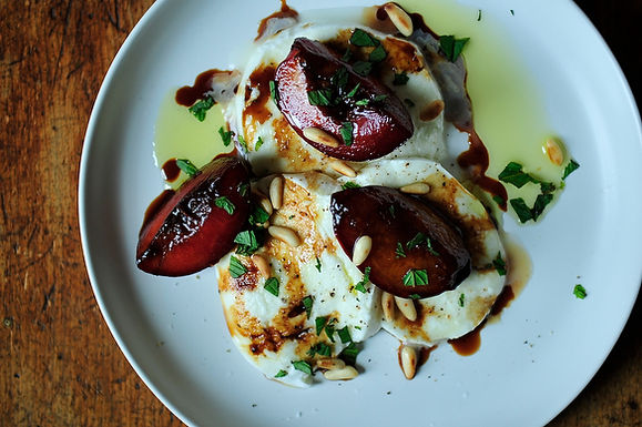 Buffalo mozzarella with balsamic glazed plums, pine nuts and mint