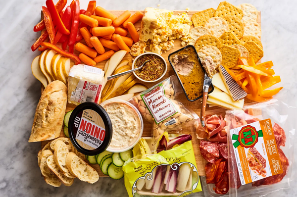 Building a charcuterie board with items from Trader Joe’s