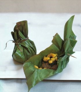 Bulgogi barbecue burgers baked in banana leaf parcels