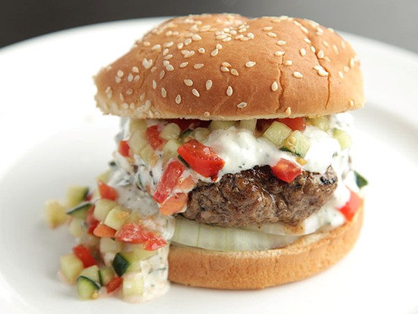 Burgers with creamy feta sauce and tomato-cucumber relish