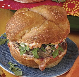 Burgers with sun-dried-tomato mayo and arugula