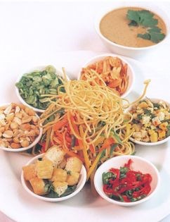 Burmese cold noodle salad with hot curry sauce (Kassa)
