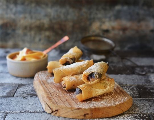 Burnt fig jam and banana spring rolls with brandy butter sauce