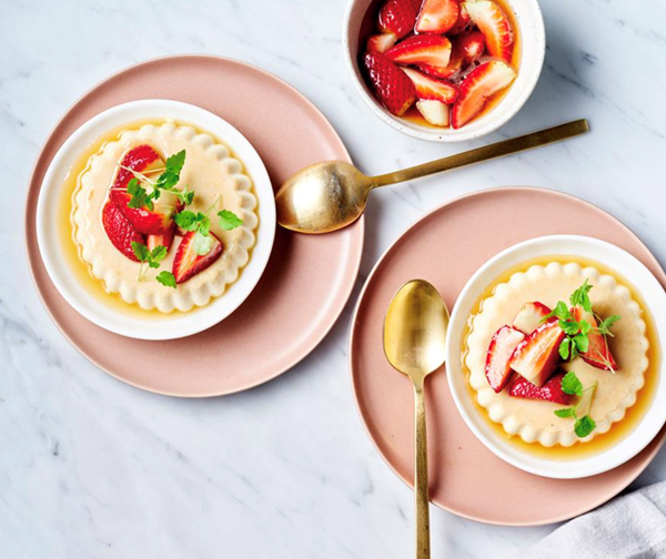 Burnt honey panna cotta with chamomile strawberries