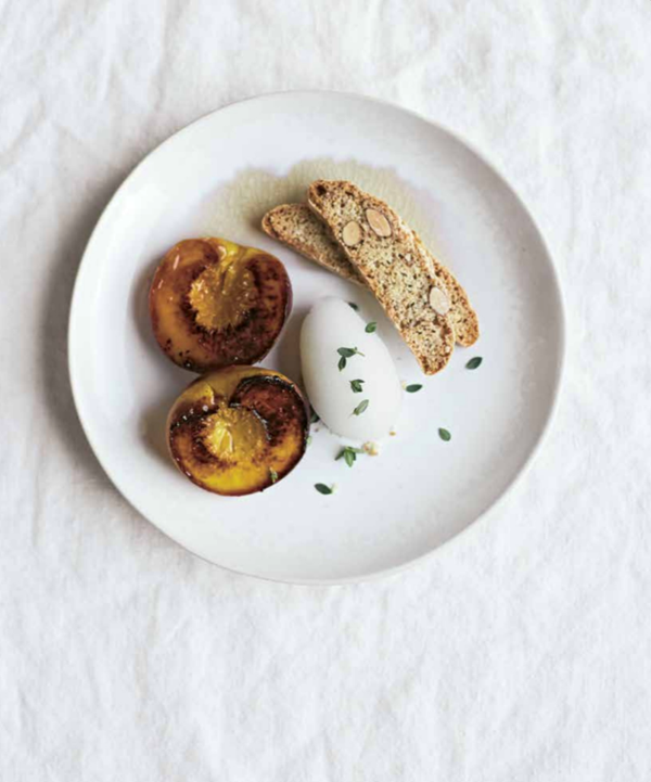 Burnt peaches with Prosecco sorbet and almond biscotti