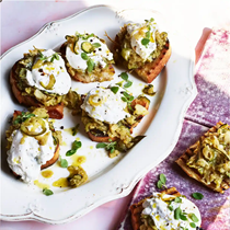 Burrata on bruschetta with stewed courgettes and fennel with marjoram