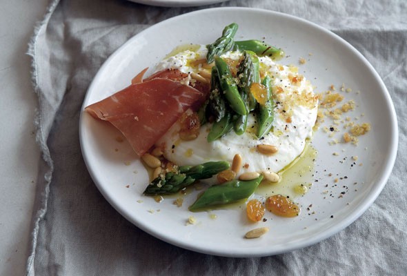 Burrata with asparagus, pine nuts, and golden raisins