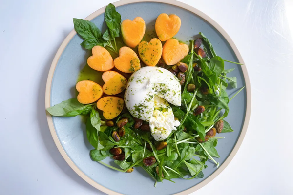 Burrata with basil olive oil, cantaloupe & toasted pistachios
