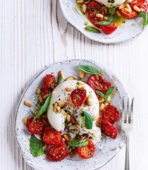 Burrata with sticky roasted tomatoes, pine nuts and basil