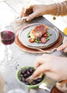 Burrata wrapped in prosciutto with tomato, olive, basil and pea salad