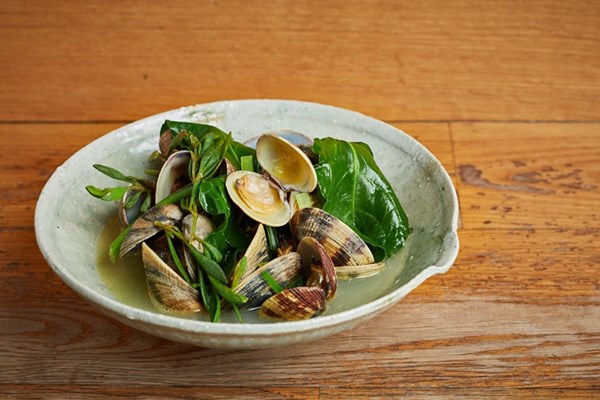 Butter and sake-steamed clams with coastal greens