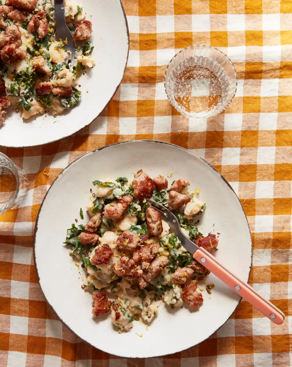 Butter-bean mash with sausages and lemony greens