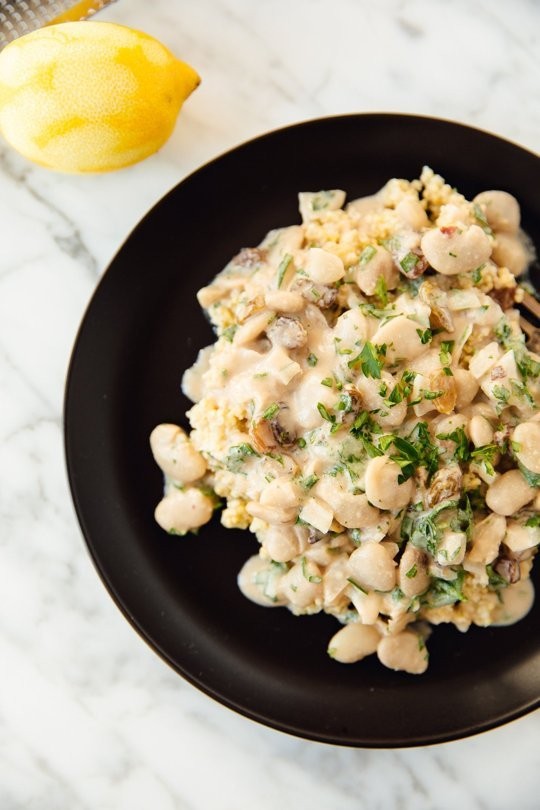 Butter beans in tahini sauce over lemony millet