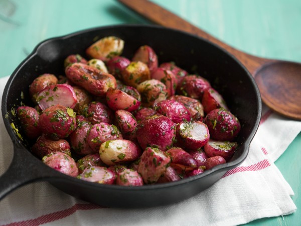 Butter-glazed roasted radishes with fresh herbs