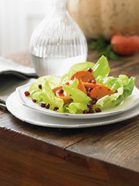 Butter lettuce salad with persimmons and pomegranate