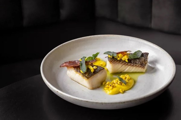 Butter roasted black cod with BBQ sweetcorn, sage and bacon 