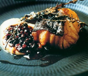 Butter-roasted cod with silky mash and spiced lentils