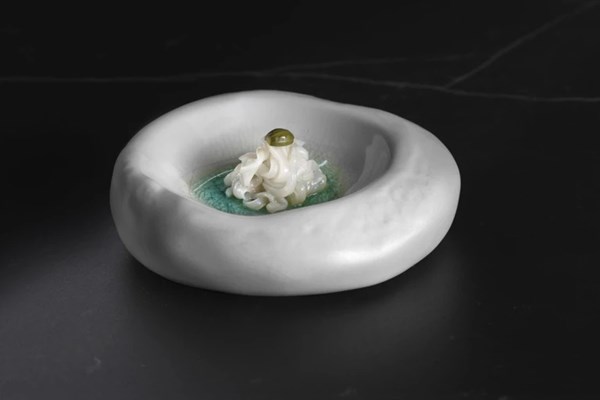 Buttered raw squid with lime (Calamar kru con salsa de mantequilla)