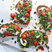 Buttered spinach, tomato and mozzarella toasts