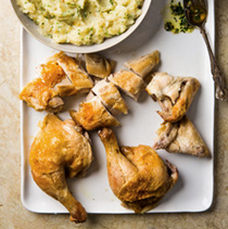 Butterflied chicken with garlic smashed potatoes