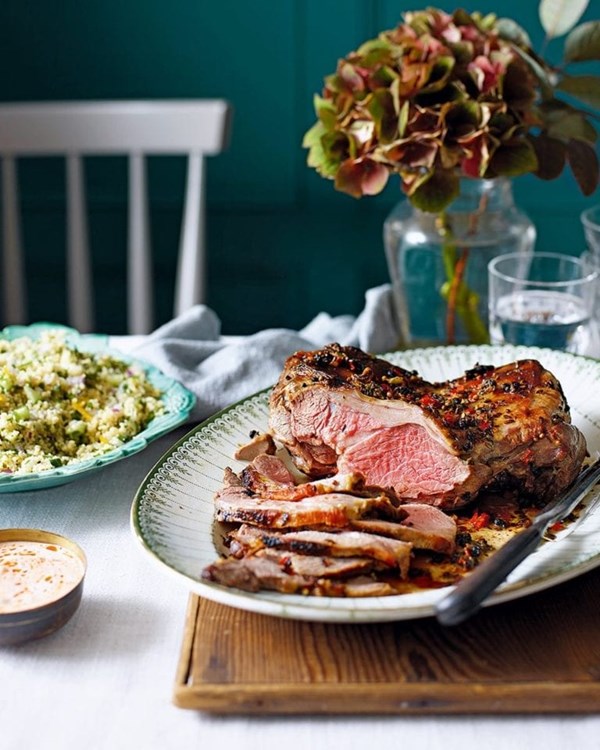 Butterflied marinated leg of lamb with couscous salad & harissa yogurt