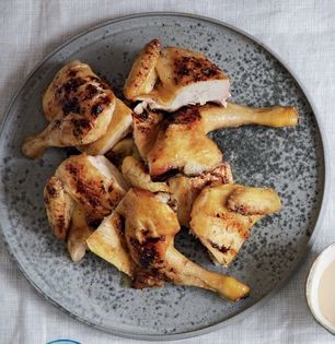 Butterflied poussin with yuzu honey glaze