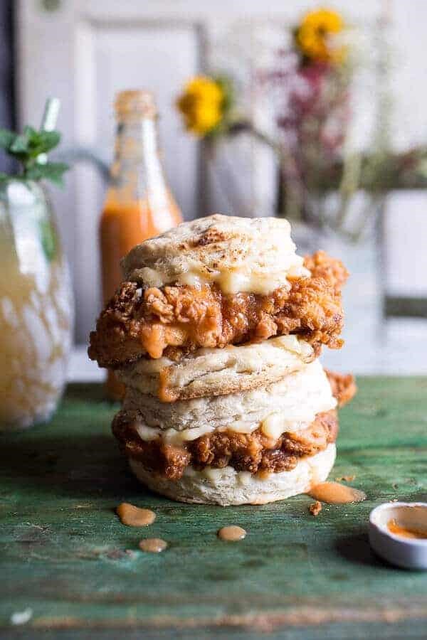Buttermilk chicken biscuit with habanero peach hot sauce + honey butter