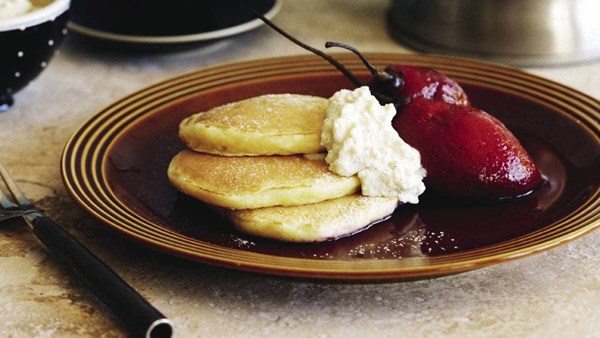 Buttermilk pancakes with poached tamarillos and ricotta cream