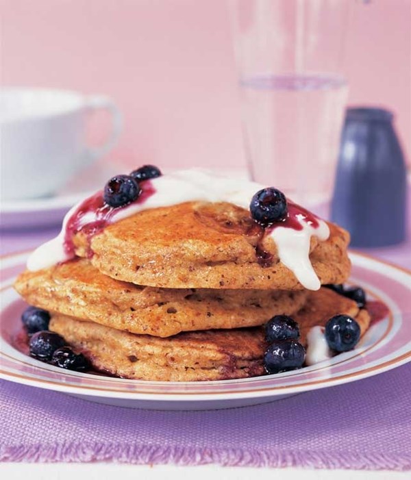 Buttermilk wheat germ pancakes with yogurt and blueberry sauce