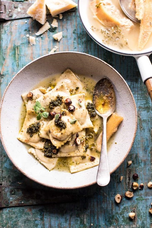 Butternut ravioli in garlic Parmesan broth and hazelnut pesto