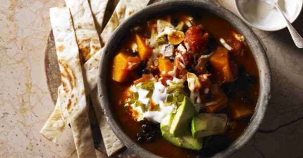 Butternut squash and black bean soup with tortillas