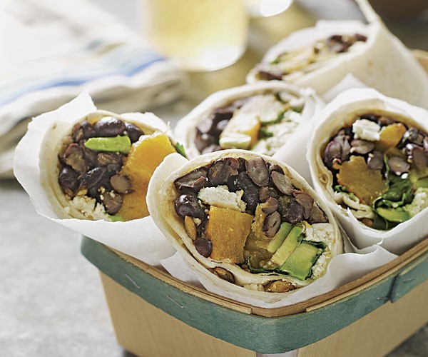 Butternut squash and smoky black bean burritos with queso fresco and pepitas