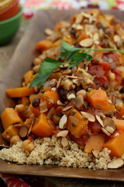 Butternut squash stew with chickpeas, raisins, & almonds over whole wheat couscous