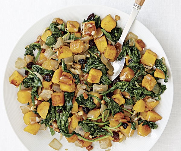 Butternut squash with spinach, raisins, and pine nuts