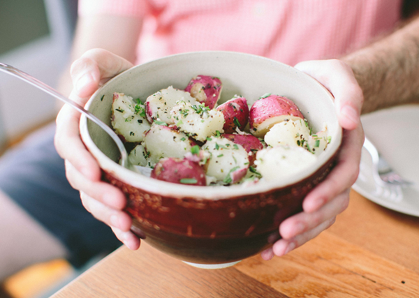Buttery new potatoes with garlic and herbs