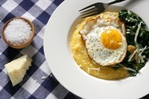 Buttery polenta with Parmesan and olive oil-fried eggs and Swiss chard