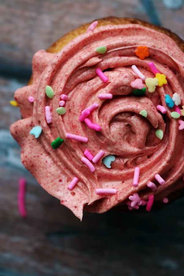 Buttery vanilla cupcakes with raspberry buttercream