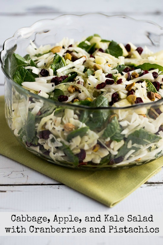 Cabbage, apple, and kale salad with cranberries and pistachios