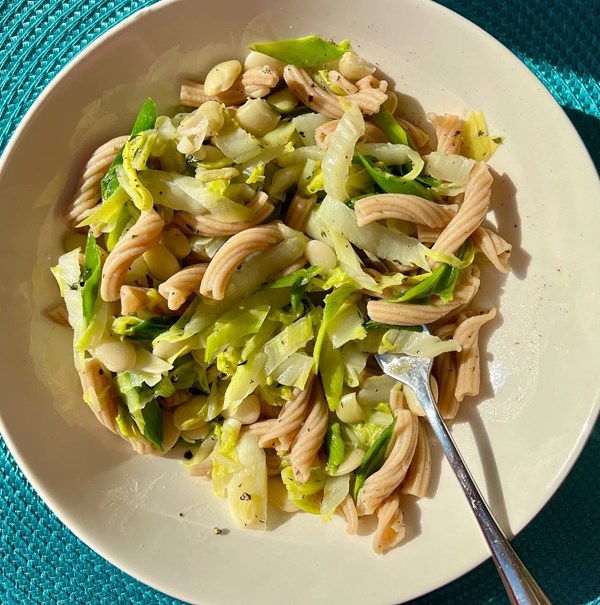 Cabbage, leeks, and white beans with pasta