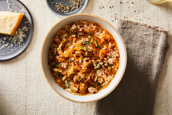 Cabbage, sausage & orzo soup with Parmesan