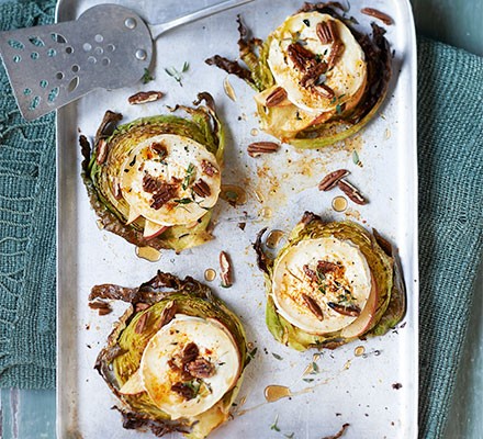 Cabbage steaks with apple, goat's cheese & pecans