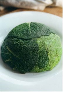 Cabbage stuffed with mushrooms, leeks, Stilton and walnuts