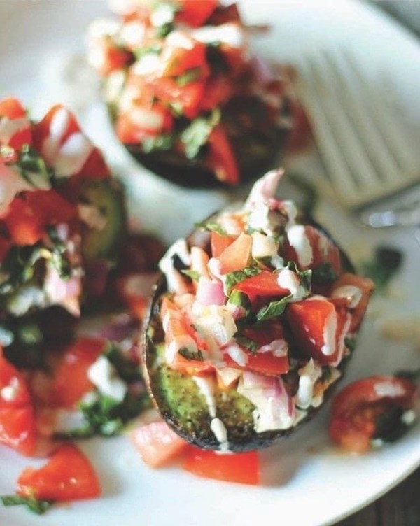 Cachaça grilled avocado with cachaça condiments