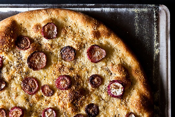 Cacio e pepe pizza with roasted radishes