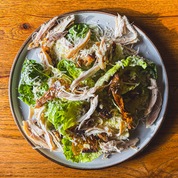 Caesar salad with chicken fat dressing