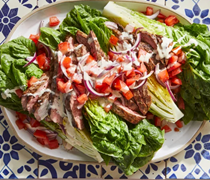Caesar salad with grilled steak