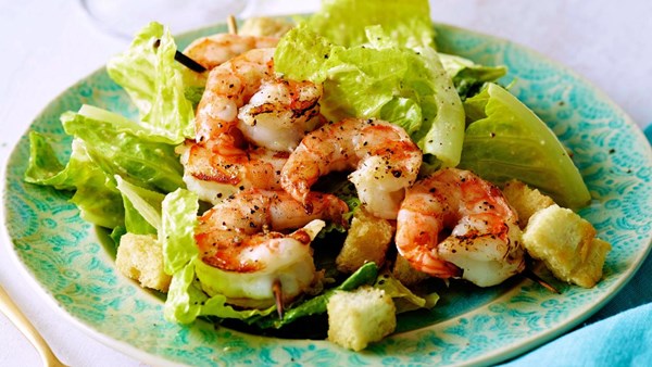 Caesar salad with lemon pepper shrimp