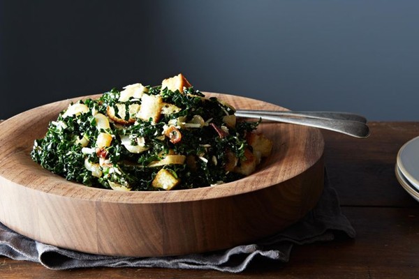 Caesar-style kale salad with roasted onions and ricotta salata